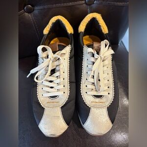 Coach Black and Gold Leather Shoes with Yellow Shearling